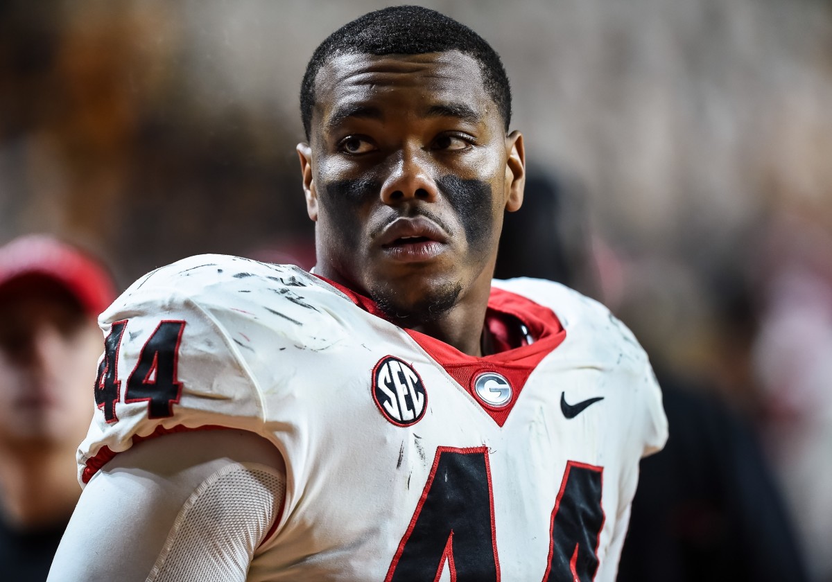 Georgia EDGE Travon Walker stands on sideline
